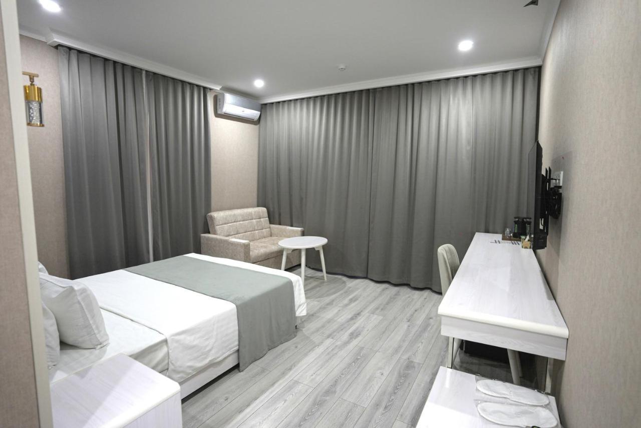 Moffah Grand Hotel Taskent Habitación foto